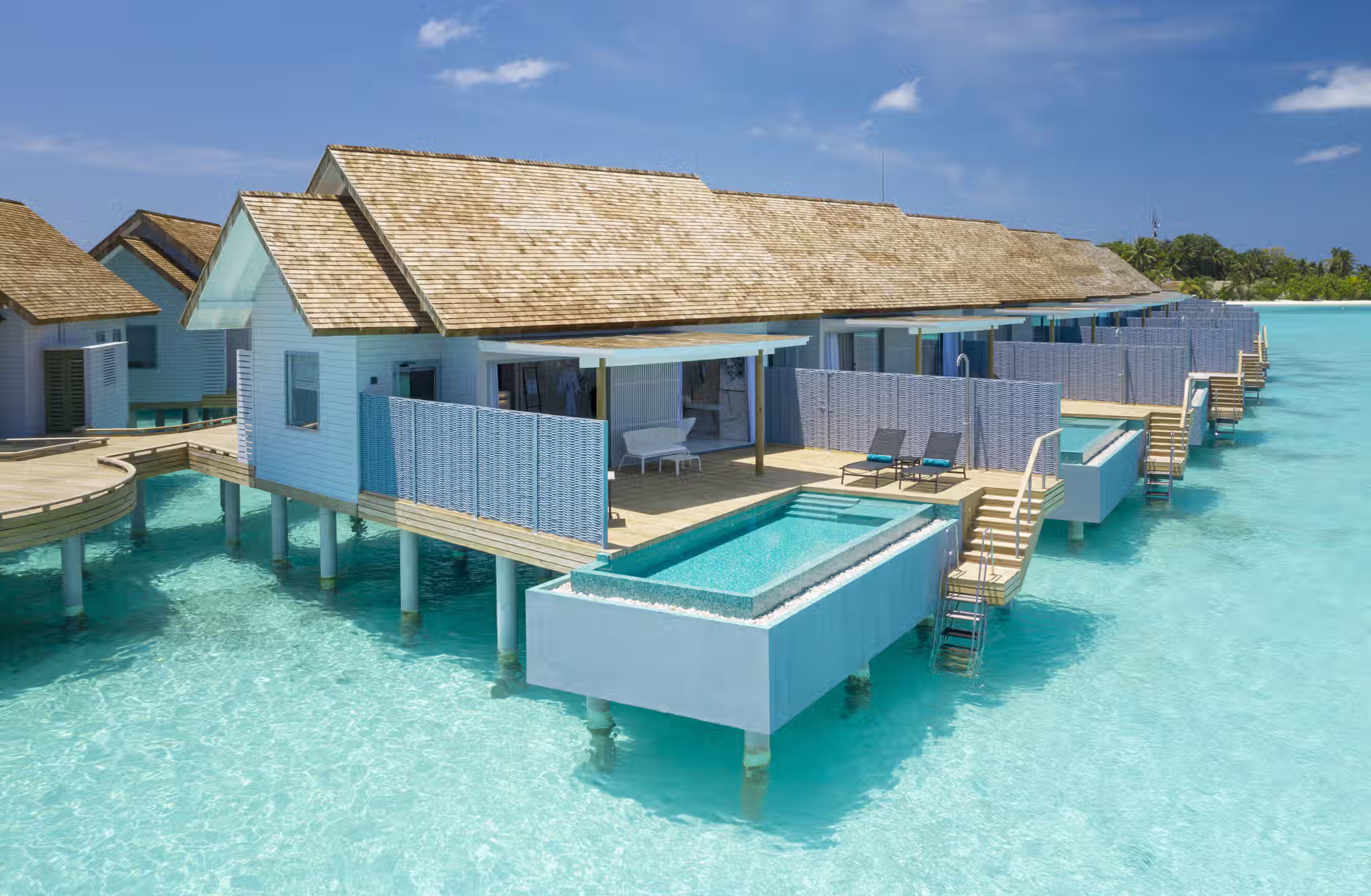 Cinque tipologie di ville per vivere la spiaggia, la laguna e la privacy di una piscina privata. — immagine 1